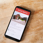 Mobile phone showing online real estate listing